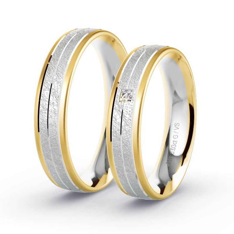 Alianzas Oro amarillo/oro blanco - 0.03 kt Diamantes - Modelo N°1693 Alianzas Oro amarillo/oro blanco - 0.03 kt Diamantes - Modelo N°1693